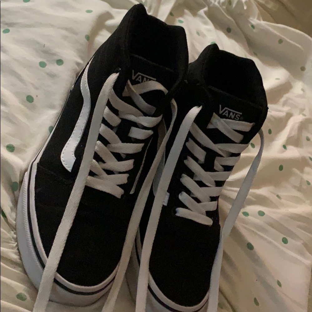 White and black Vans